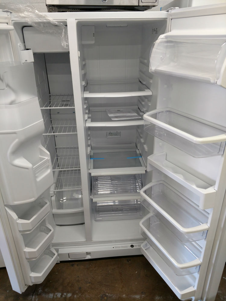 Whirlpool white side by side refrigerator  interior