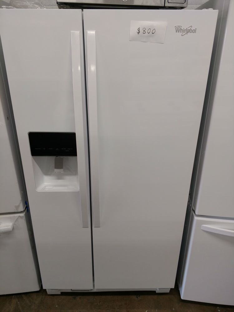 Whirlpool white side by side refrigerator  